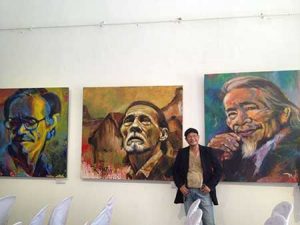 Artist Tran Dat, paints portraits, calligraphy works, sketches