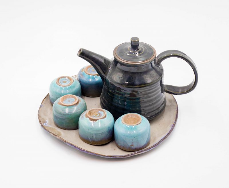 art ceramic tea pot and cups with blue enamel